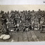 Three photographs re on board ship and trench.