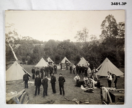 Camp with tents and soldiers milling around pre WW1