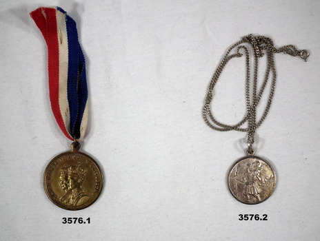 Two medallions issued for specific events.