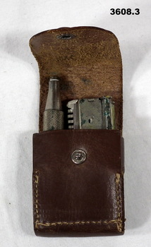 Shaving kit in leather case.