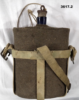 Blue metal water bottle with cover.