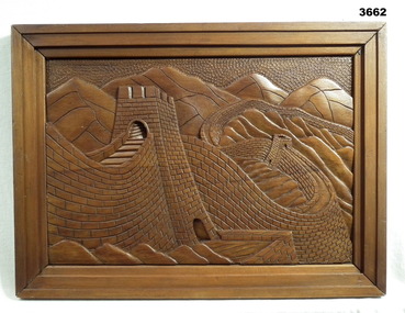 Wood carving of the Great Wall of China.