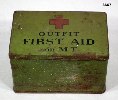 Tin, green colour, first aid kit.