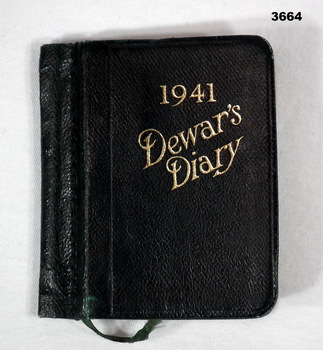Small diary with Dewars Diary 1941 on front.