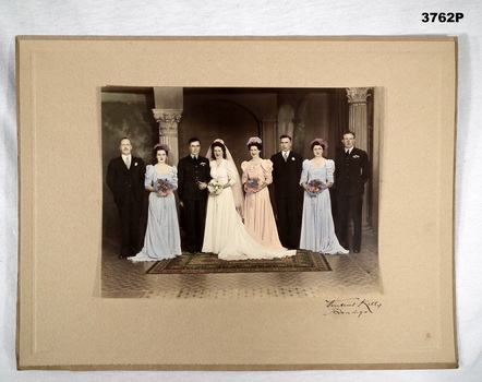 Colour photo on backing of an RAAF wedding