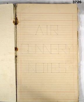 Handwritten notes in ruled book.