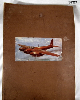 Hard cover cardboard ringed folder.
