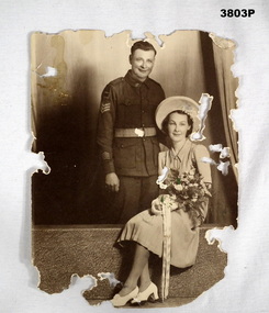 Photo of a soldier and lady.