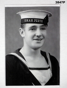 B & W photograph portrait of a sailor.