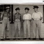 Two photographs of 4 Officers slightly different.