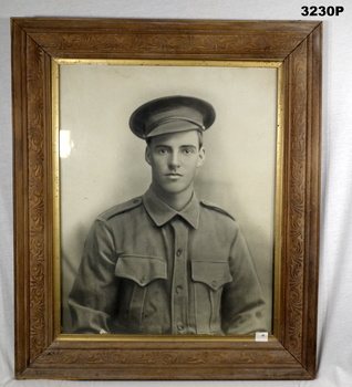B & W portrait of a soldier WW1 framed.