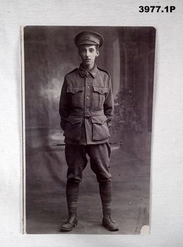 B & W photograph of a soldier standing.