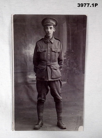 B & W photograph of a soldier standing.