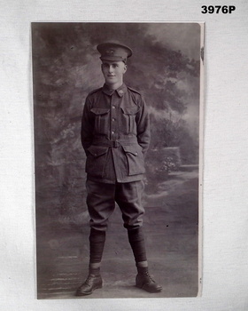 B & W photograph of a soldier standing.