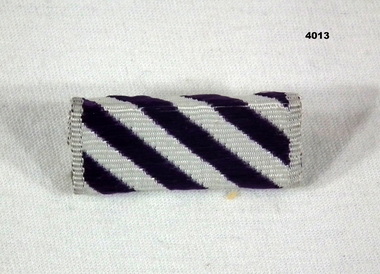 Ribbon relating to the award of a DFC.