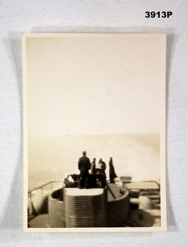 Photo of a man on a ships stern