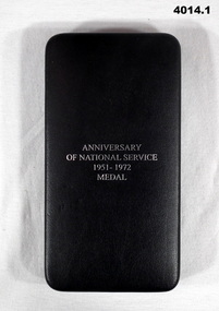 Black case re National service medal.