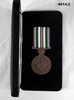 Black case showing the National service medal.