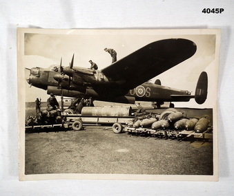 Lancaster Bomber being loaded up a mission