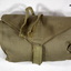 Khaki colour folding sewing kit.