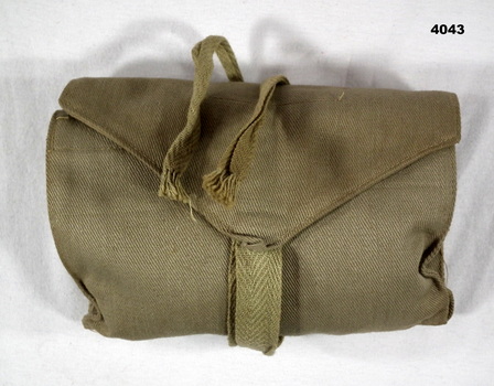 Khaki colour folding sewing kit.