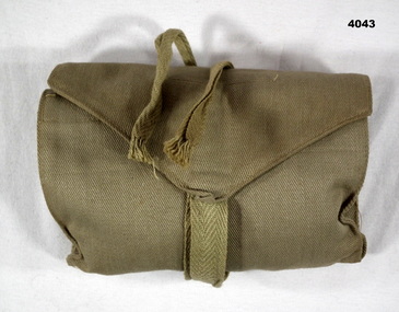 Khaki colour folding sewing kit.