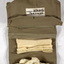 Sewing kit open showing some contents.