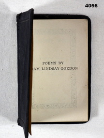Book of poetry with hand written piece from a soldier.