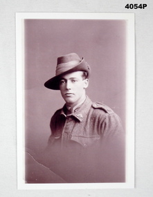 Sepia tone portrait of a WW1 soldier.