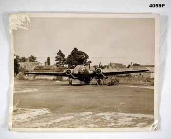 Photo re a twin engine bomber on tarmac WW2