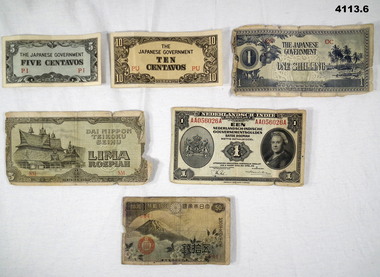 Five currency notes Japanese and Dutch
