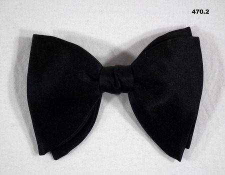 Black bow tie part of Mess Dress