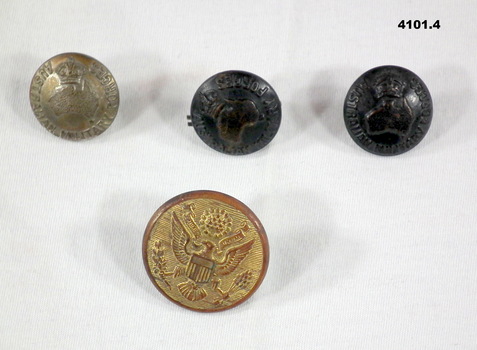 Three Australian and one American uniform buttons