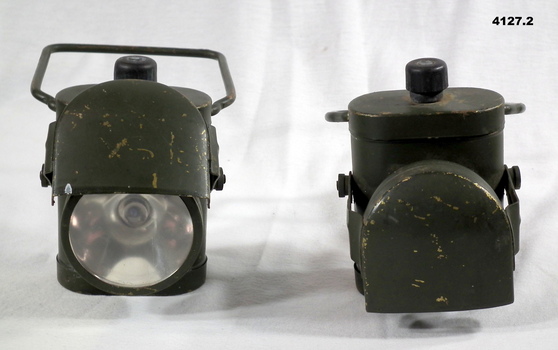 Two waist belt fitting lamps WW2