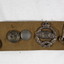 Canvas belt with a collection of Badges and buttons
