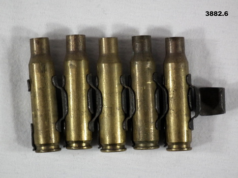 Section of 7.62mm cartridge cases and link