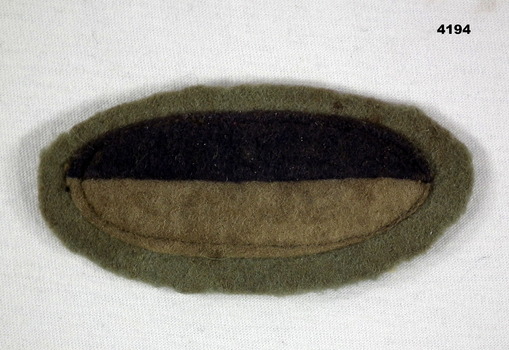 Oval shaped felt colour patch.