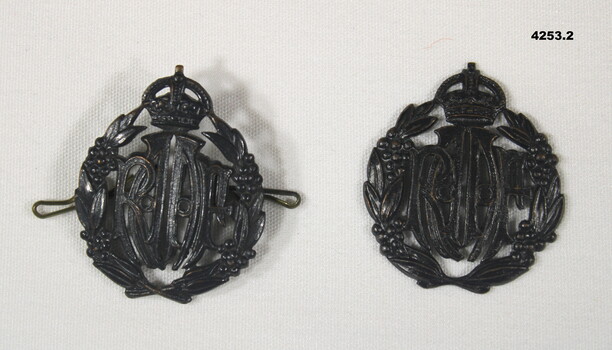 Two RAAF hat badges WW2.
