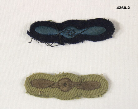 Two RAAF propellor shape shoulder patches.