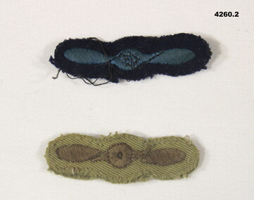 Two RAAF propellor shape shoulder patches.
