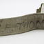 Underside of webbing belt with name on.