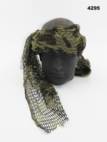 Section of camouflage sweat rag.