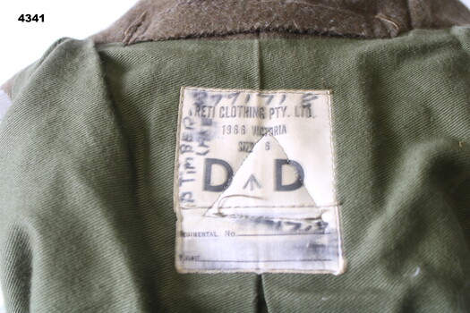 Photo showing label on a great coat.
