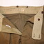 Trousers showing written owners name.