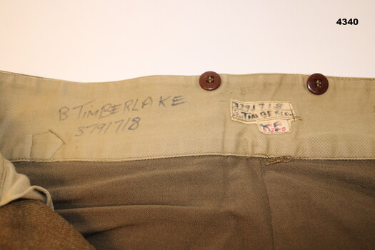 Close up of name on military trousers.