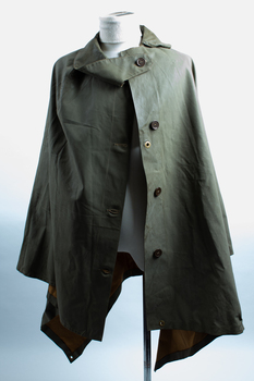 Wet weather cape or ground sheet.