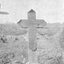 Black and white photo of a WW1 grave with cross for "Walter" on 29th.