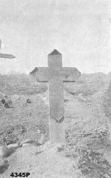 Black and white photo of a WW1 grave with cross for "Walter" on 29th.