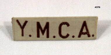 YMCA Identification badge worn on clothing