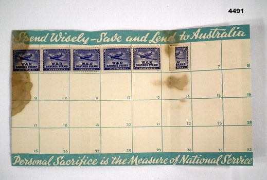 War savings stamps in folder WW2